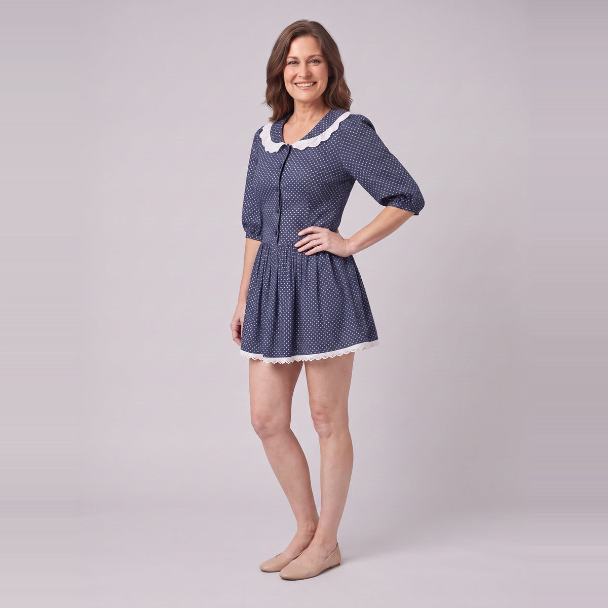 Ellery navy mini dress, three-quarter view showing the ruffled skirt