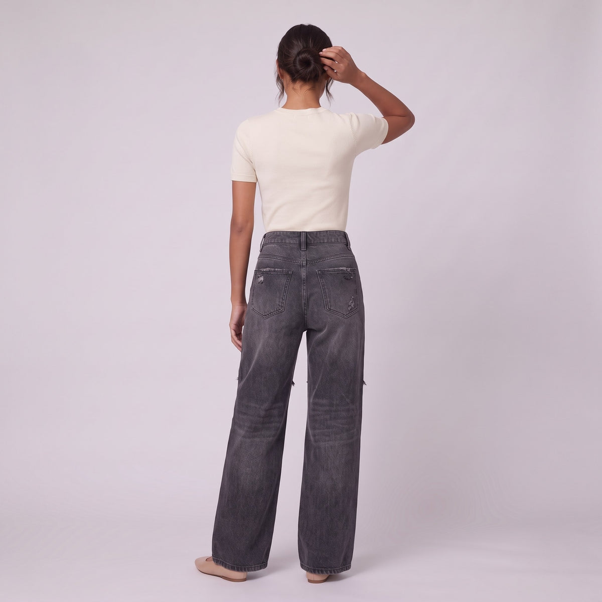 Enid baggy jeans in washed black, back view on model