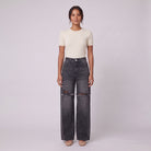 Enid baggy jeans in washed black, distressed wide leg, front view on model