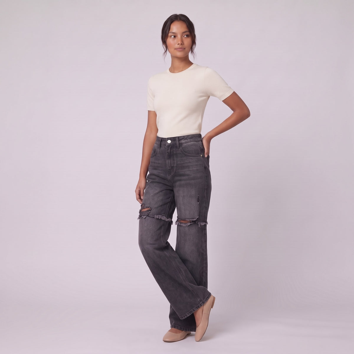 Enid baggy jeans in washed black, three-quarter view showing wide leg