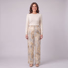 Evadne printed wide leg trousers in beige marble print, front view on model