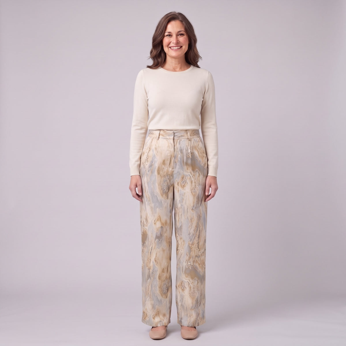 Evadne printed wide leg trousers in beige marble print, front view on model