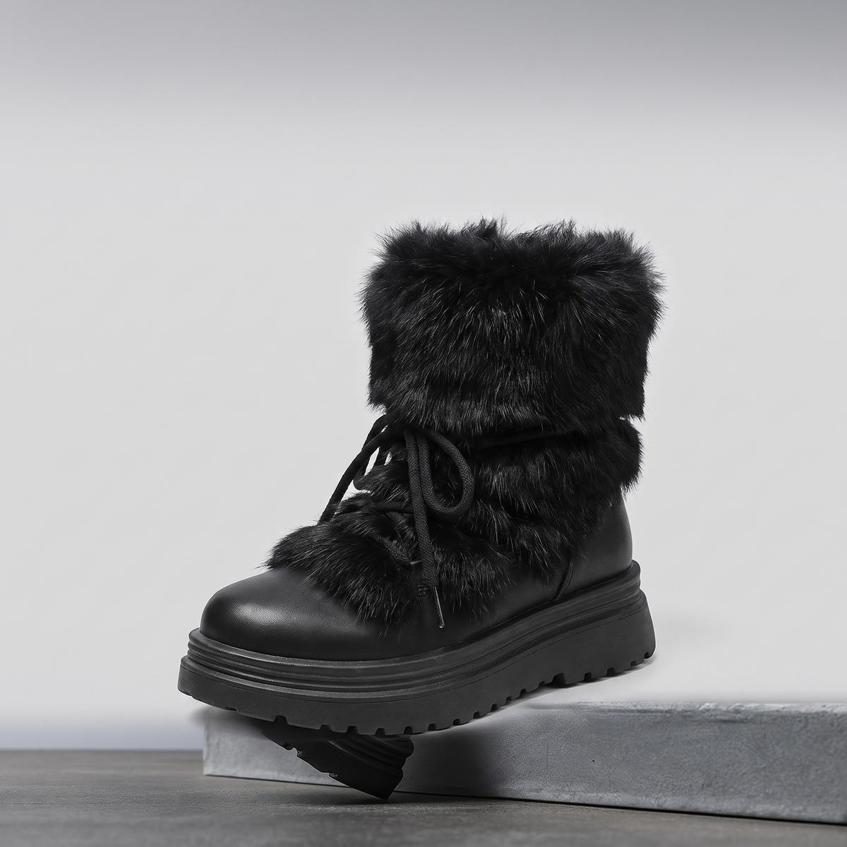 Insulated lace-up winter boots with a faux fur cuff and non-slip sole, view 1