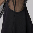 Black evening dress with sheer sleeves and a fluid skirt, view 6
