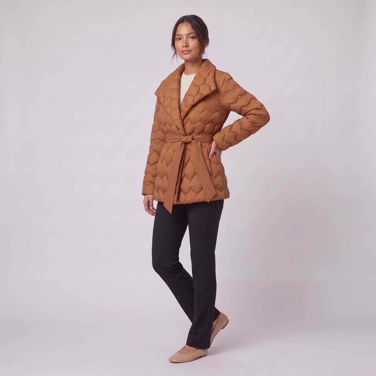 Ghislaine quilted belted jacket in caramel, three-quarter view showing the tied waist belt