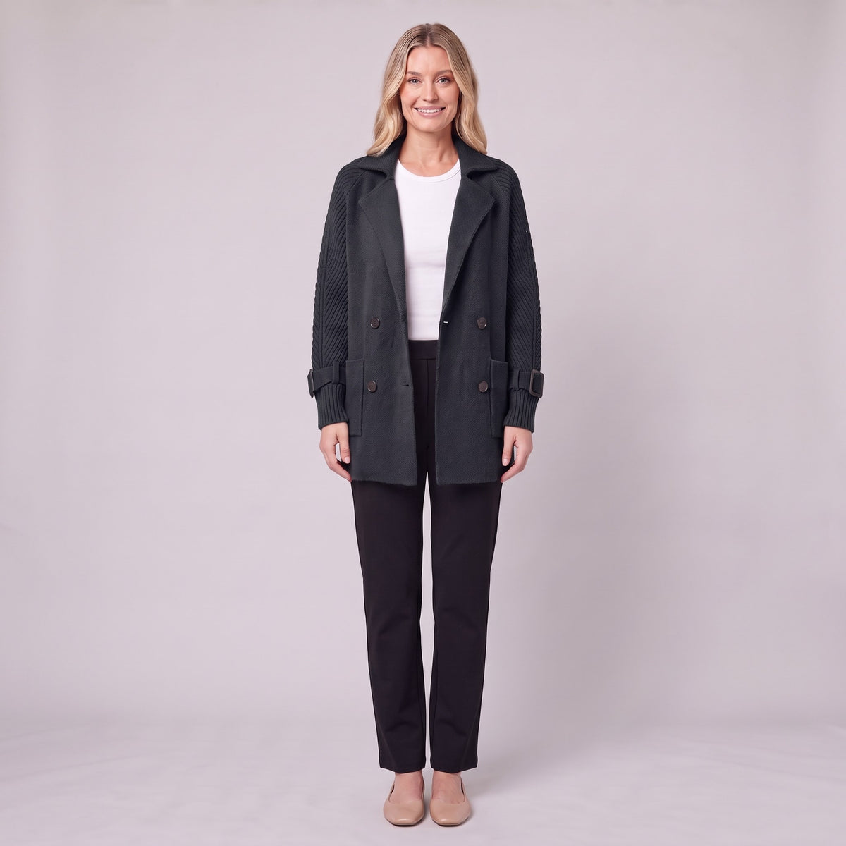 Gwenneth double-breasted knit coat in black, front view on model