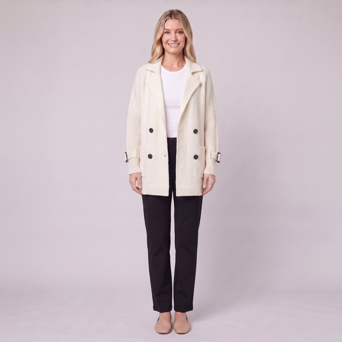 Gwenneth double-breasted knit coat in cream white, front view on model