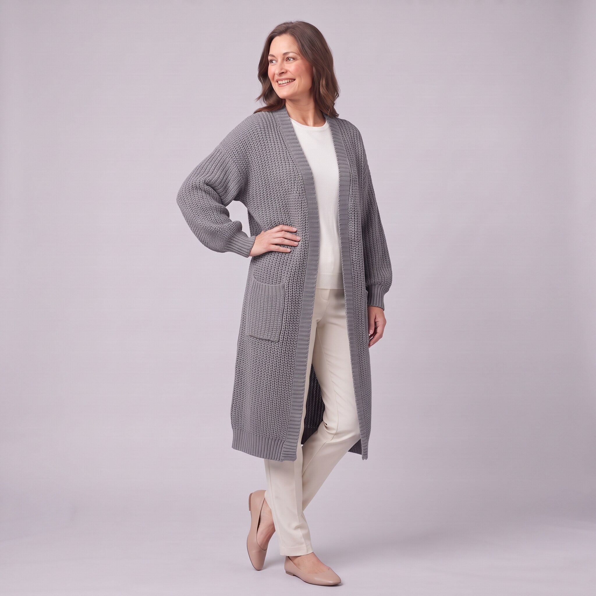 Halla longline cardigan in grey, three quarter view showing below knee length