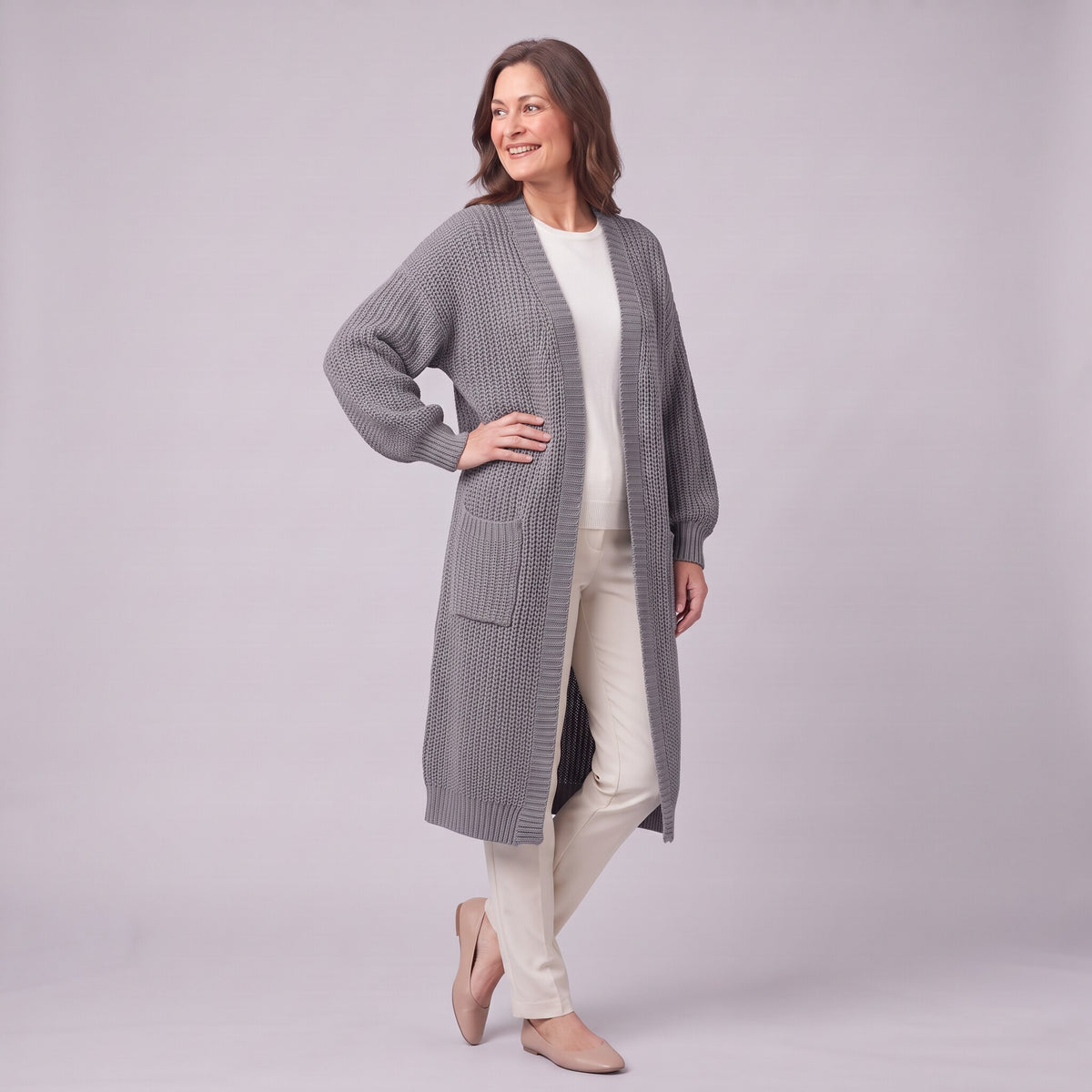Halla longline cardigan in grey, three quarter view showing below knee length