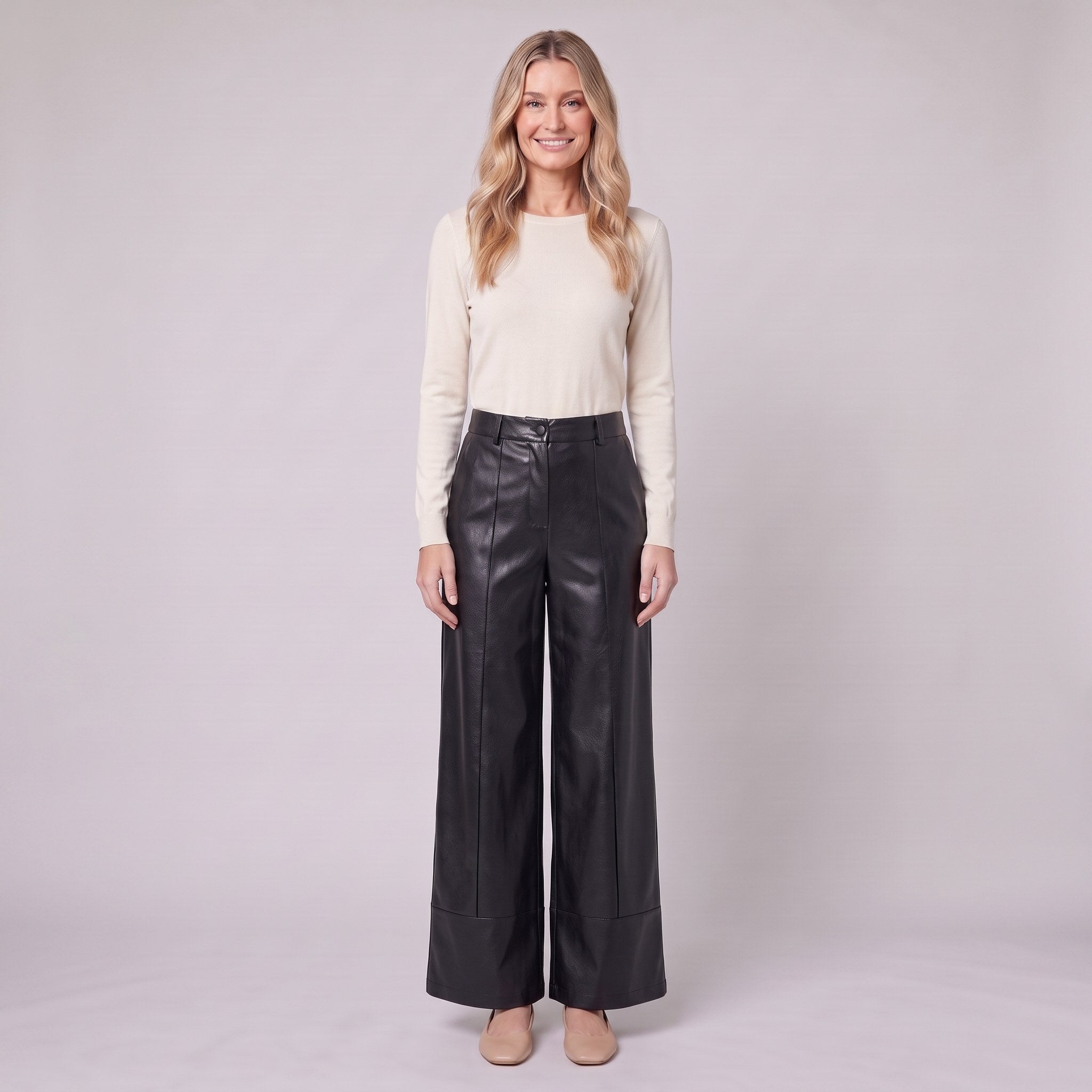 Helka faux leather wide leg trousers in black, front view on model
