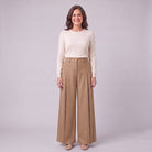 Hesper pleated wide leg trousers in camel beige, front view on model