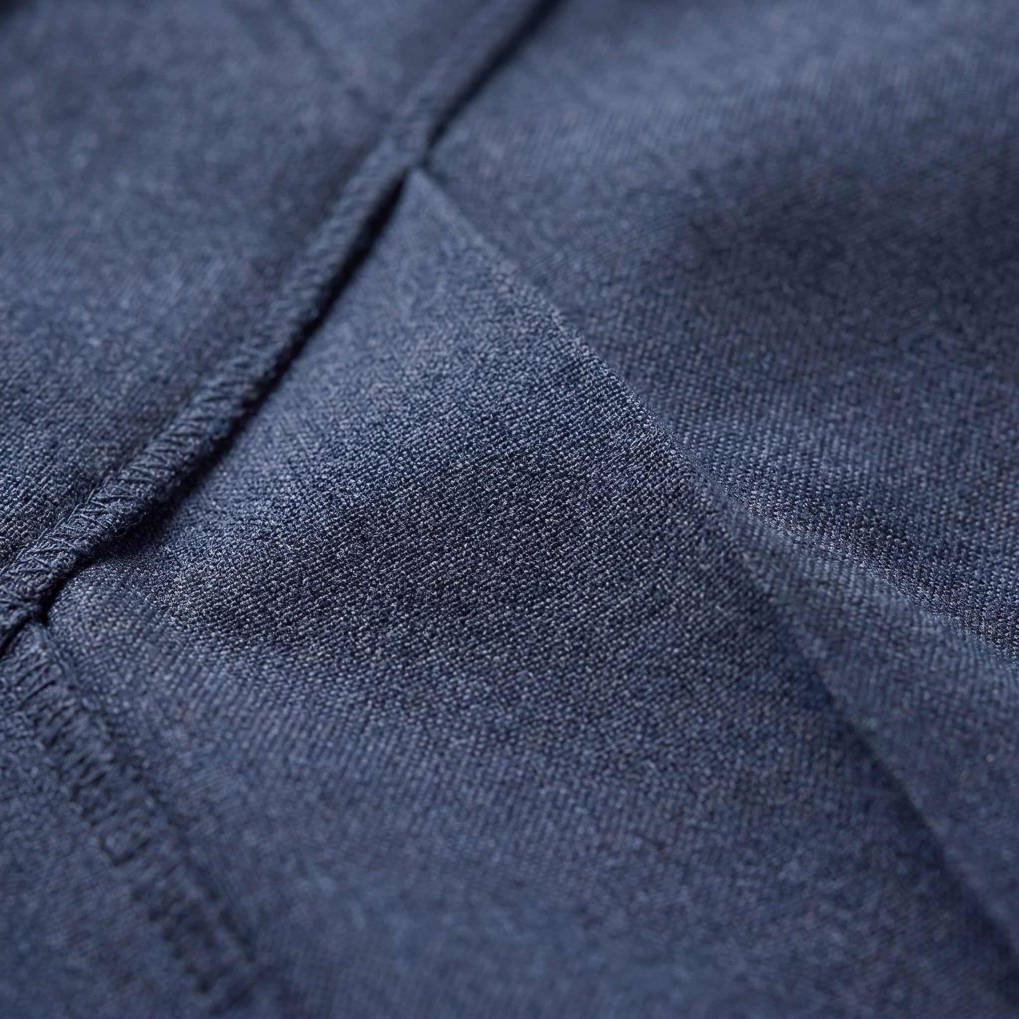 Hesper pleated wide leg trousers fabric detail, woven melange and pressed pleat close-up