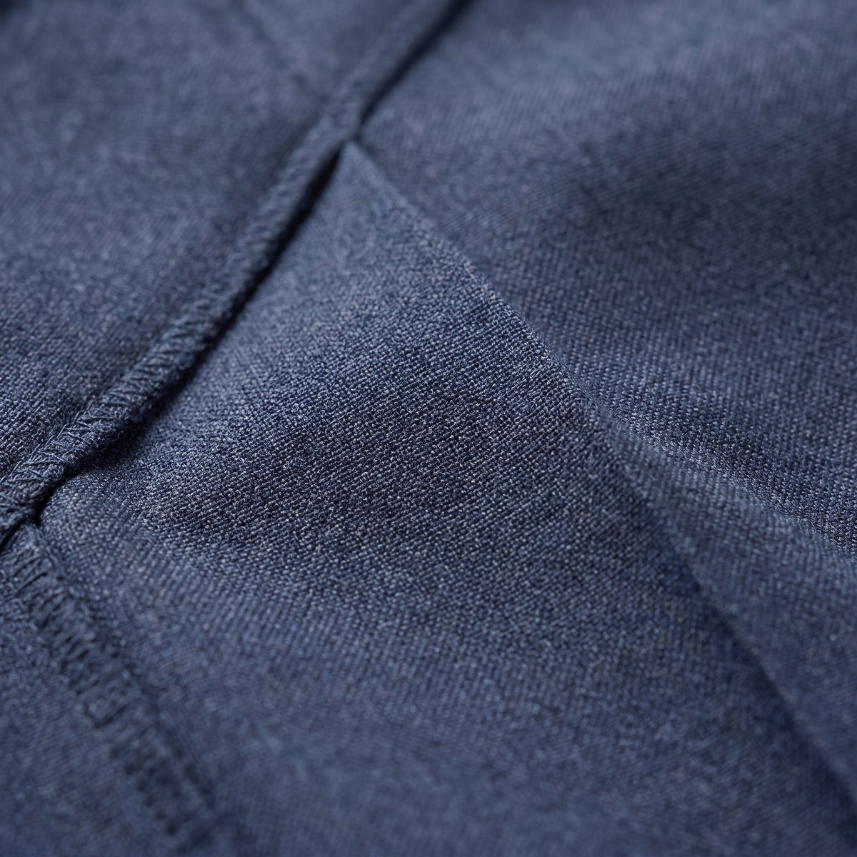 Hesper pleated wide leg trousers fabric detail, woven melange and pressed pleat close-up