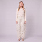 Inara baggy cargo trousers in cream ecru, front view on model