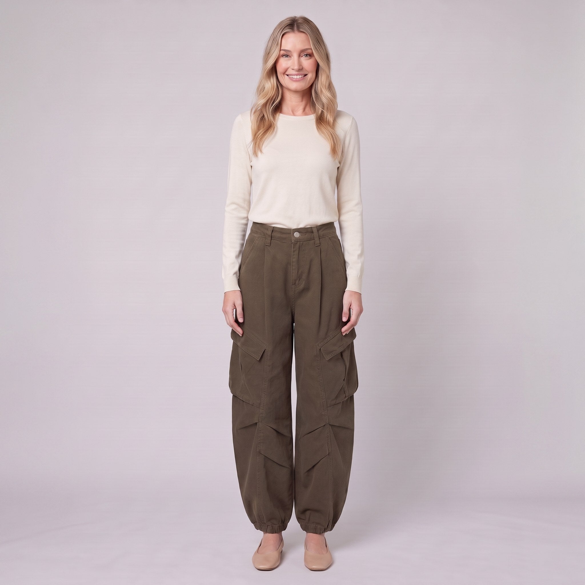 Inara baggy cargo trousers in dark olive brown, front view on model