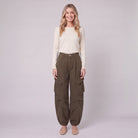 Inara baggy cargo trousers in dark olive brown, front view on model