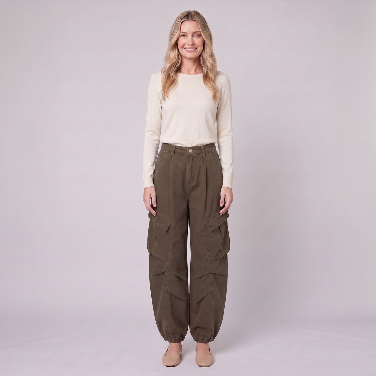 Inara baggy cargo trousers in dark olive brown, front view on model