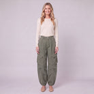 Inara baggy cargo trousers in army sage green, front view on model