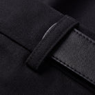 Ingeborg straight leg trousers fabric detail, black twill weave and leather belt close-up