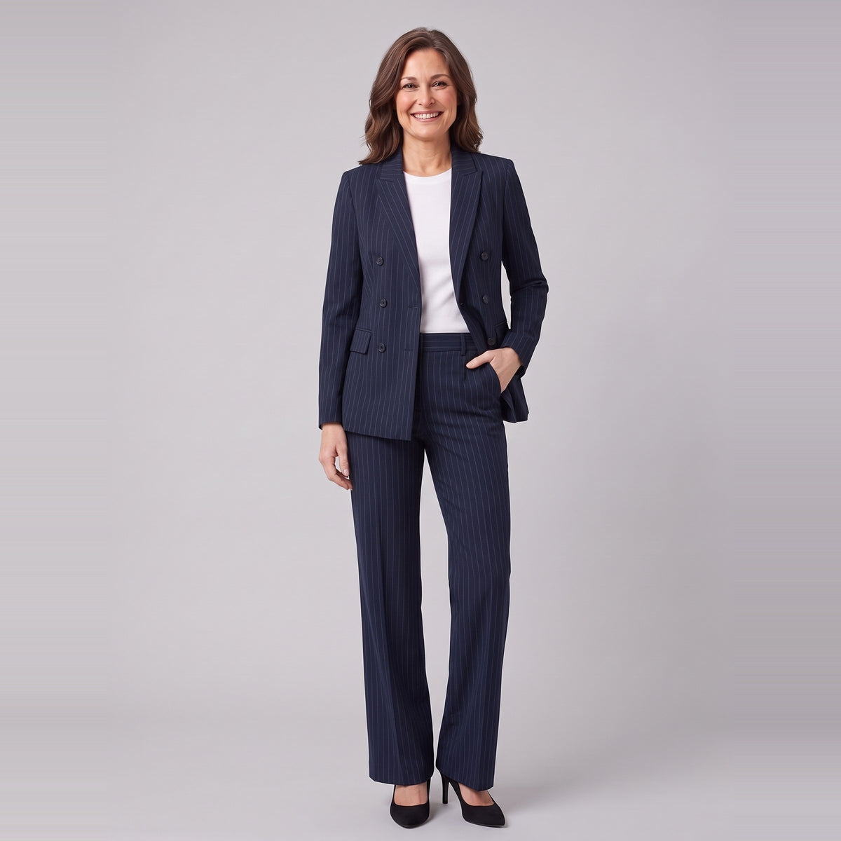Iris navy pinstripe double-breasted blazer with matching wide-leg trousers, front view