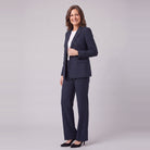 Iris navy pinstripe suit, three-quarter view showing the lapel