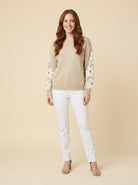 Beige soft knit jumper with a floral applique, view 1