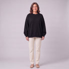 Kaia oversized sweatshirt in black, front view on model