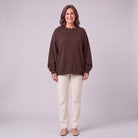 Kaia oversized sweatshirt in chocolate brown, front view on model