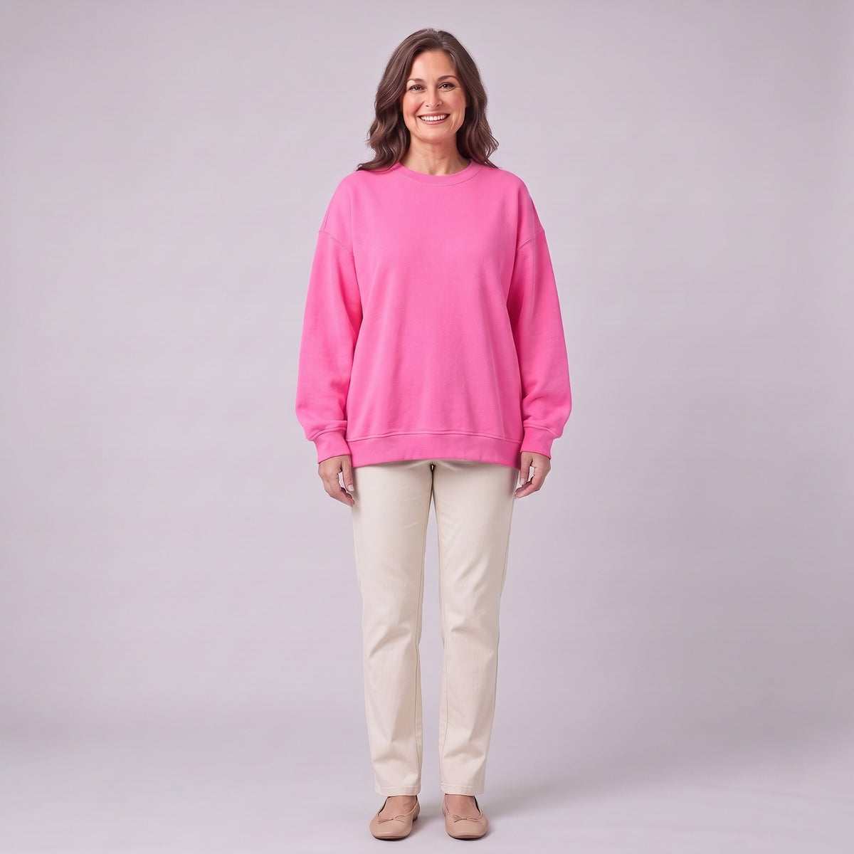 Kaia oversized sweatshirt in bright fuchsia pink, front view on model