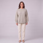 Kaia oversized sweatshirt in light greige, front view on model