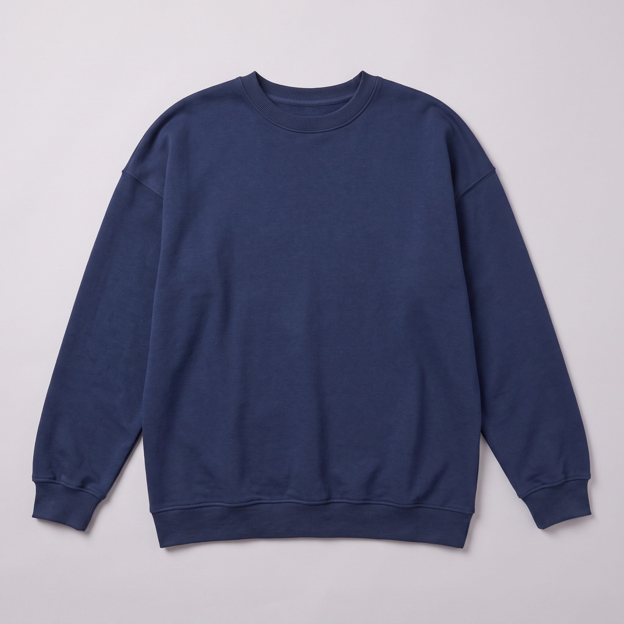 Kaia oversized sweatshirt in navy, flat lay of the crew neck sweatshirt