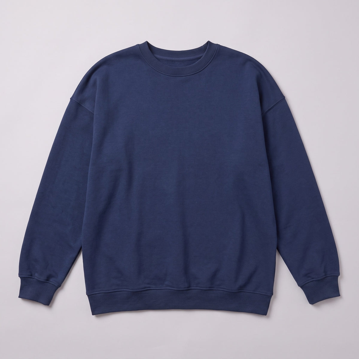 Kaia oversized sweatshirt in navy, flat lay of the crew neck sweatshirt