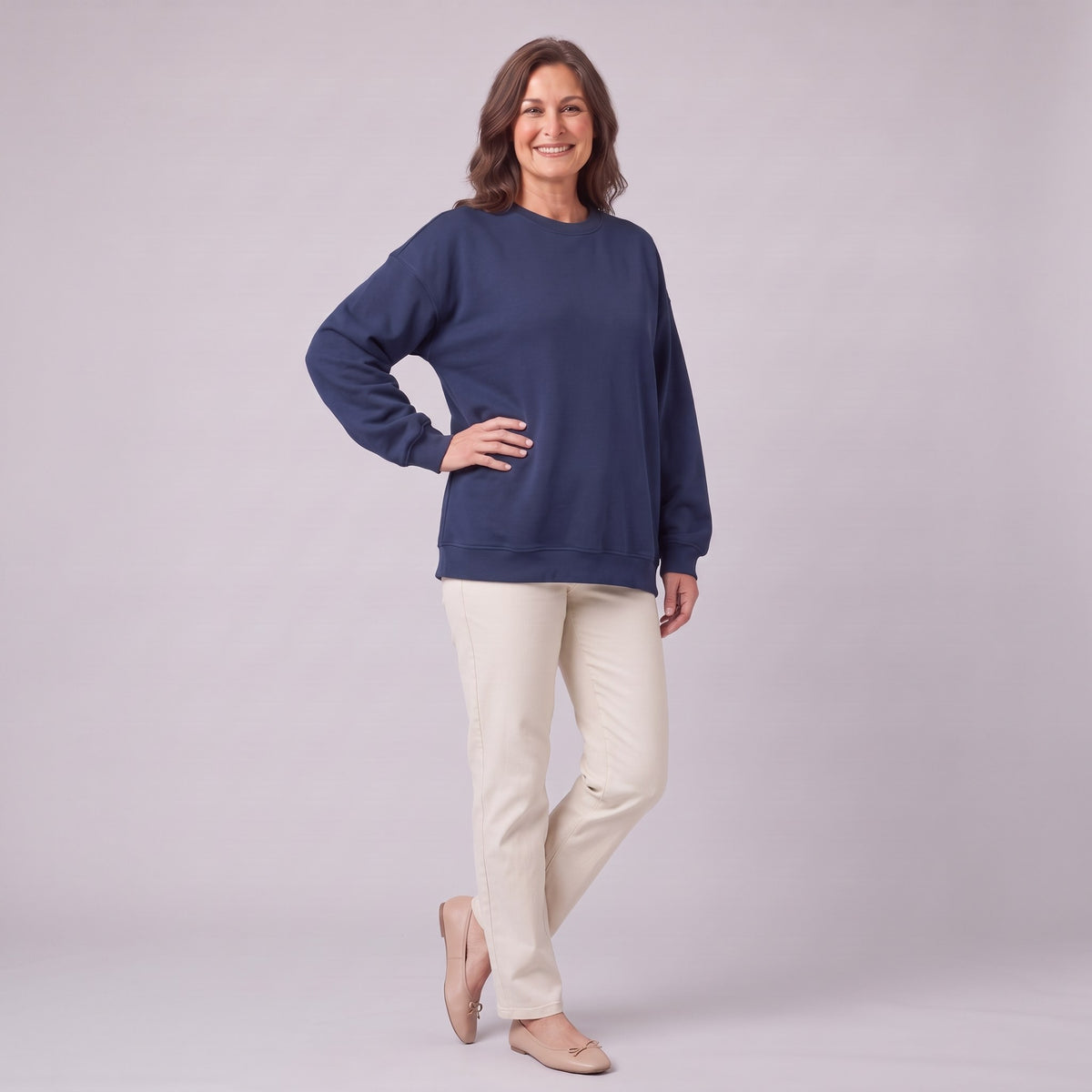 Kaia oversized sweatshirt in navy, three-quarter view showing dropped shoulders
