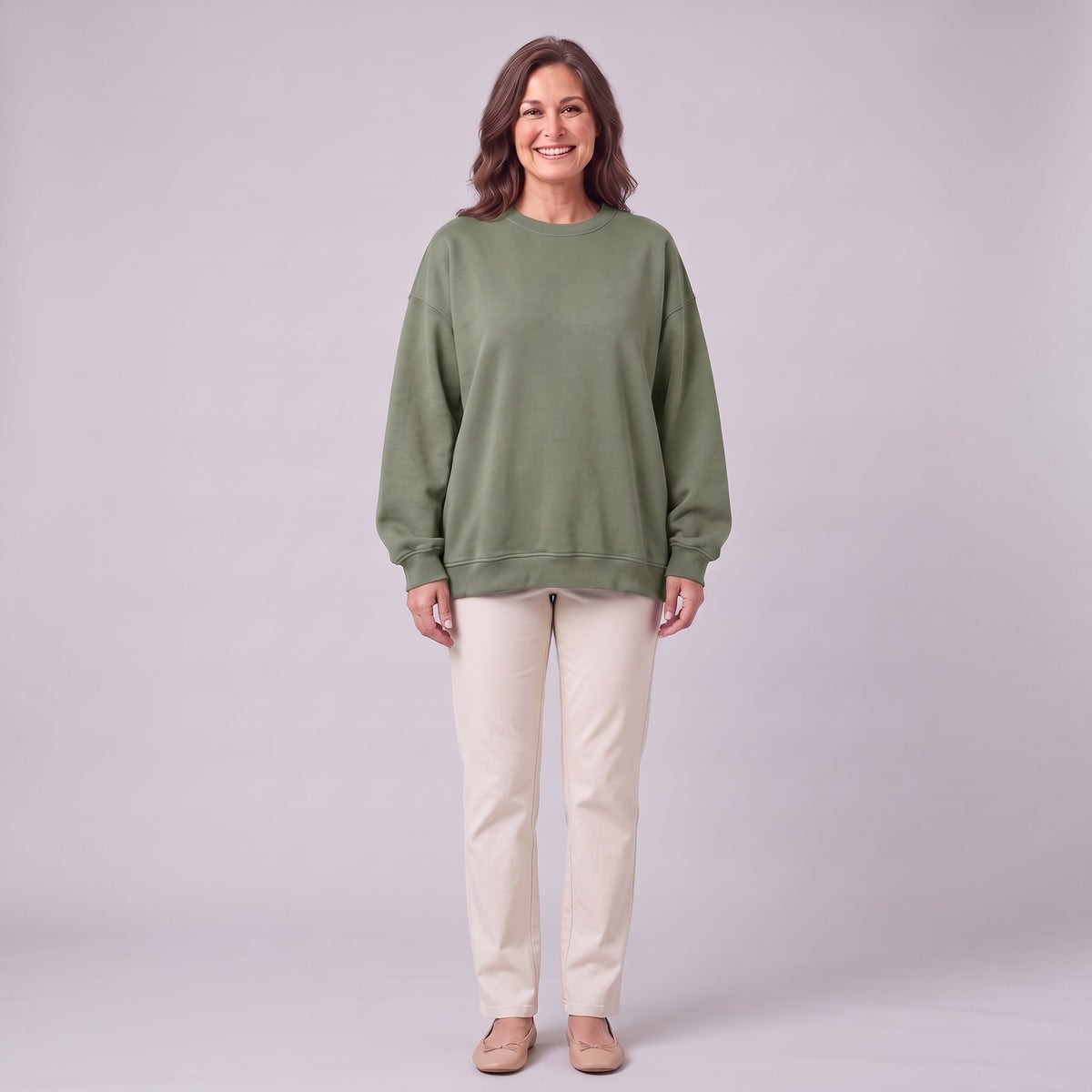 Kaia oversized sweatshirt in sage army green, front view on model