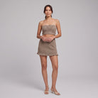 Khaki taupe knit two-piece set, strapless bandeau crop top and ruffle-hem mini skirt