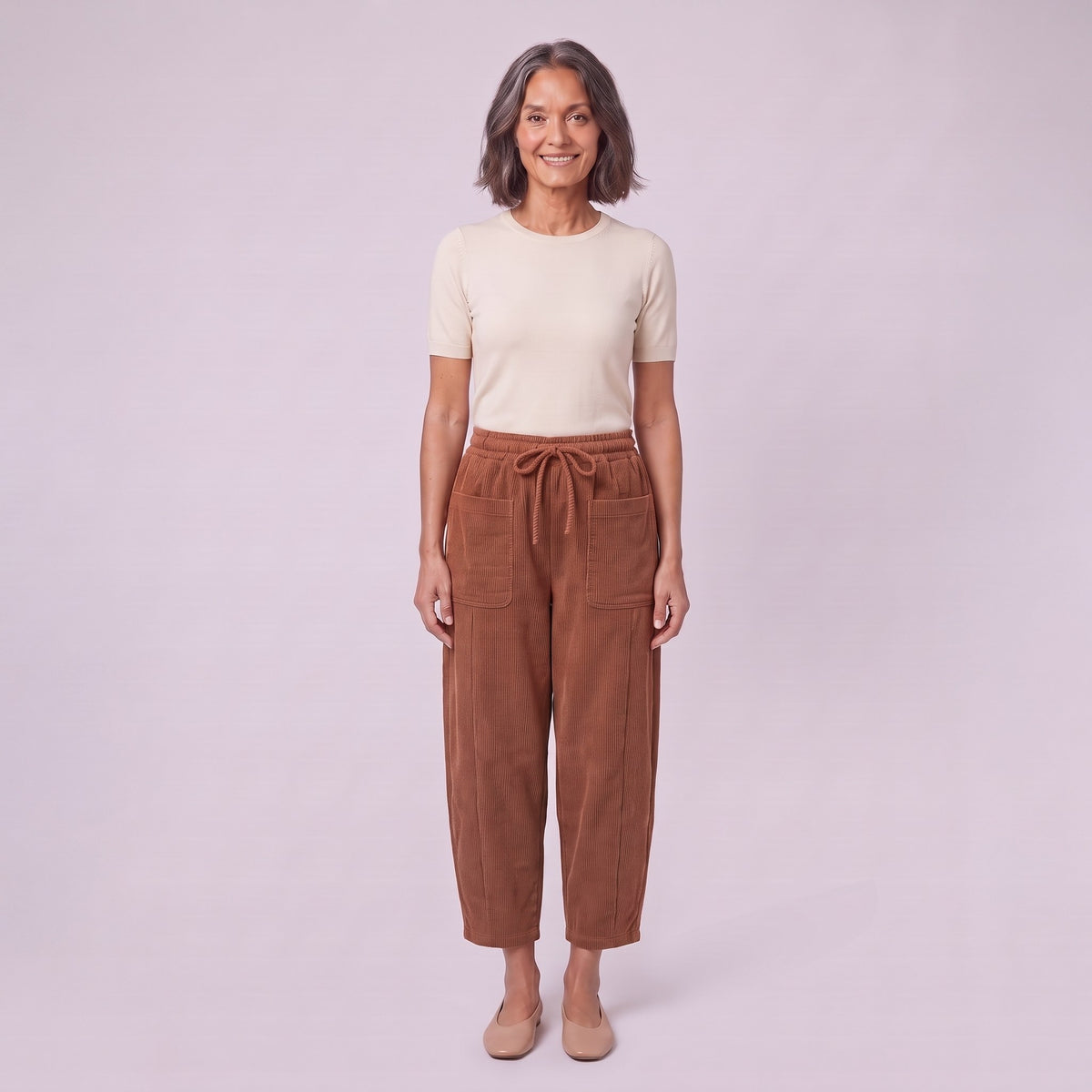 Kerensa barrel leg corduroy trousers in rust brown, front view on model
