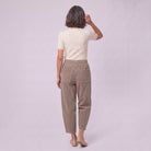Kerensa barrel leg corduroy trousers in khaki taupe, back view on model