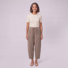 Kerensa barrel leg corduroy trousers in khaki taupe, drawstring waist, front view on model