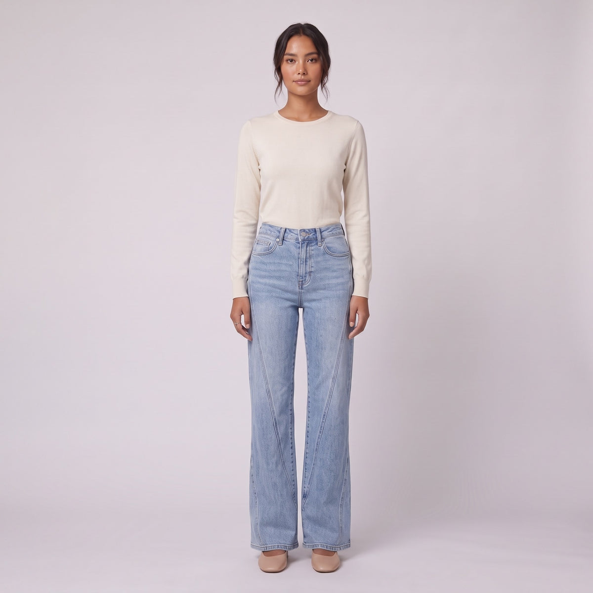 Lavinia high rise flared jeans in light wash blue denim, front view on model
