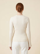Slim-fit ribbed knit top with flared cuffs, view 4