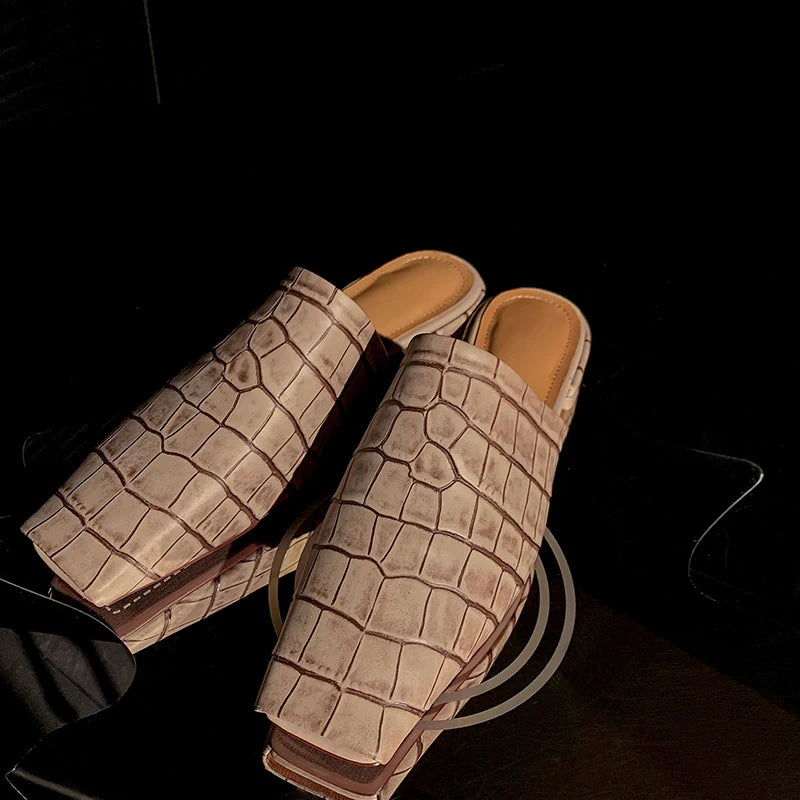 Croc-embossed mules in a leather blend with a low heel, view 3