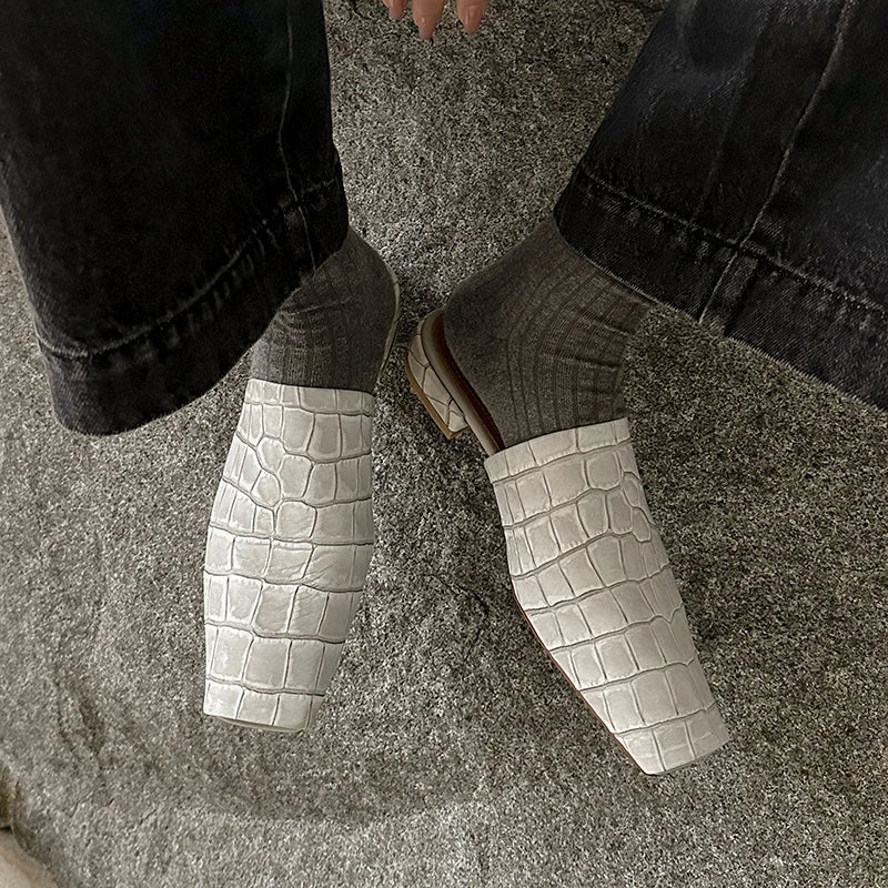 Croc-embossed mules in a leather blend with a low heel, view 8