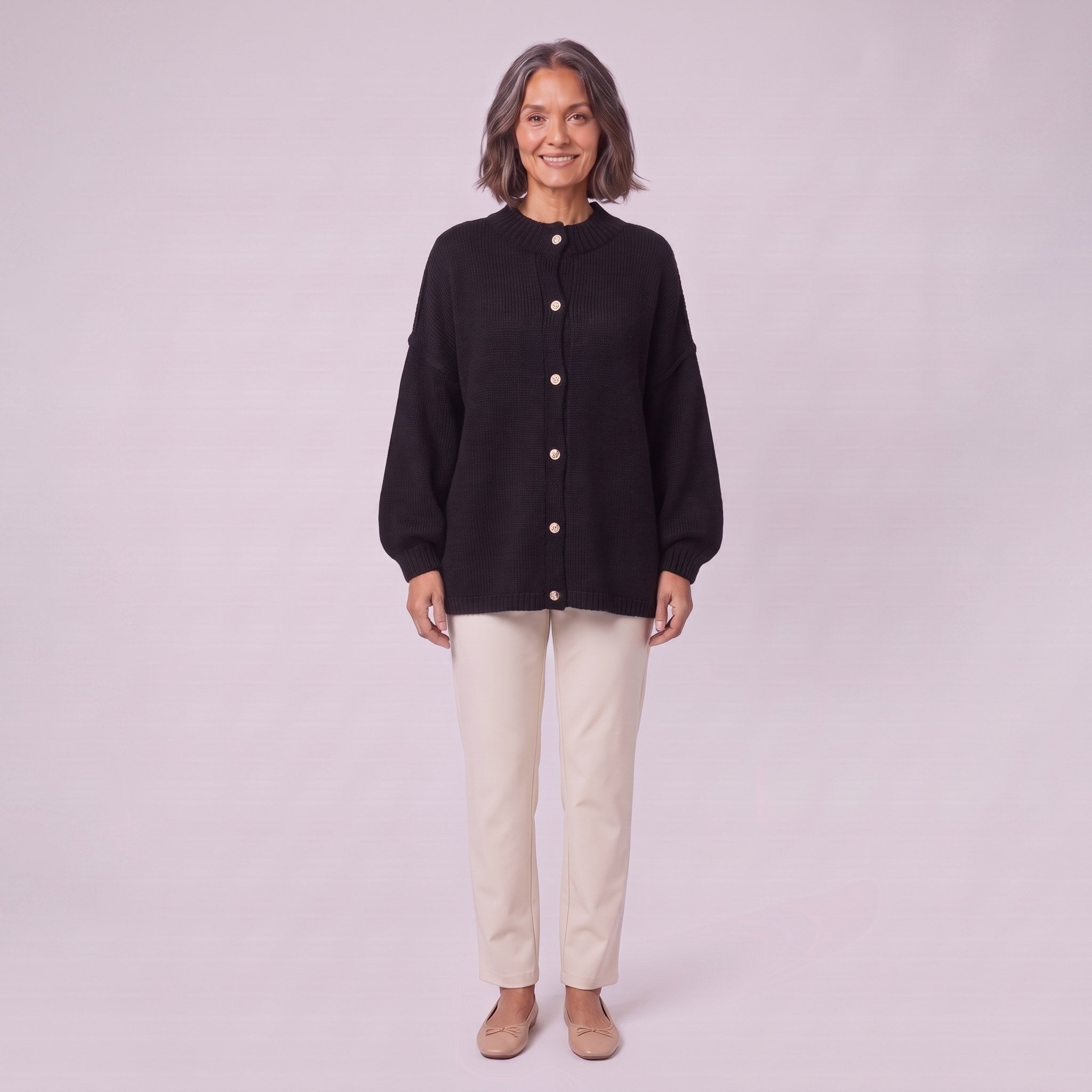 Magali oversized cardigan in black, front view on model