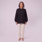 Magali oversized cardigan in black, front view on model