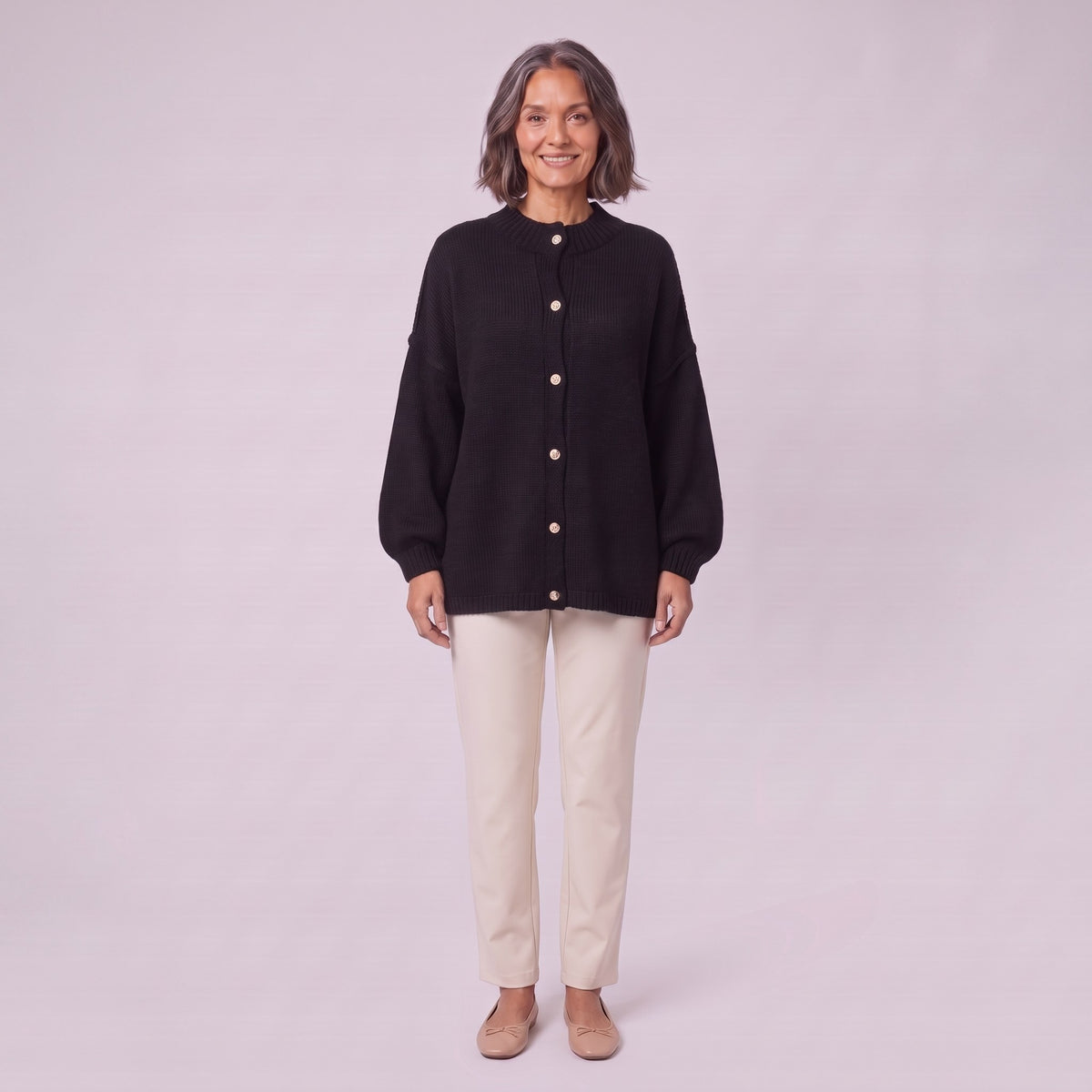 Magali oversized cardigan in black, front view on model
