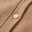 Magali oversized cardigan in camel, close-up of the soft knit and gold-tone button