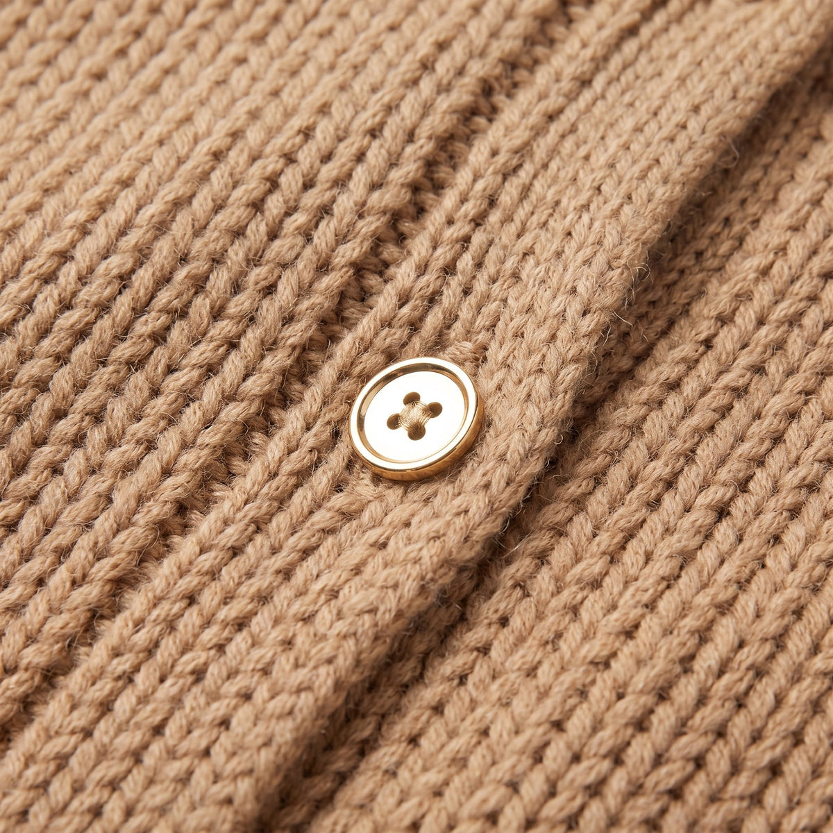 Magali oversized cardigan in camel, close-up of the soft knit and gold-tone button