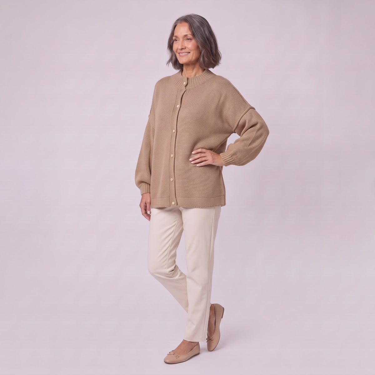 Magali oversized cardigan in camel, three-quarter view showing balloon sleeves