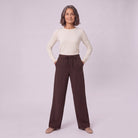Mairead wide leg trousers in milk chocolate brown, full-length view with hands in pockets