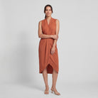 Terracotta orange sleeveless V-neck midi dress with a draped front and side slit, view 3